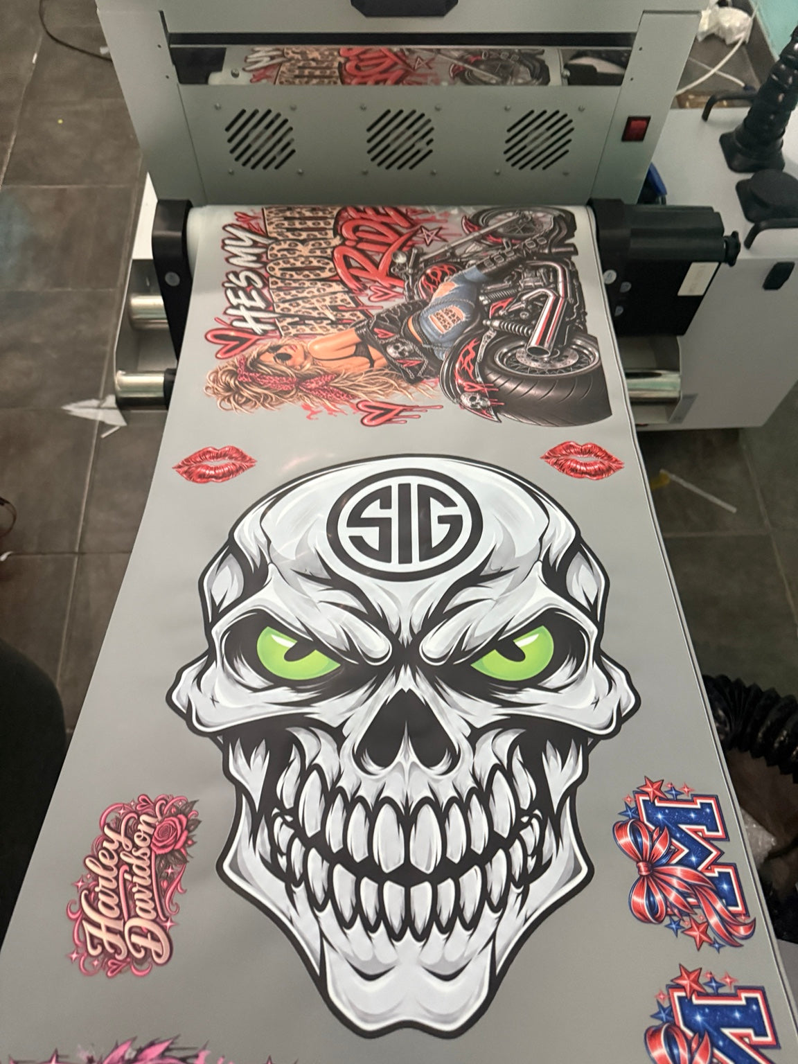 DTF gang sheet with large skull and motorcycle designs