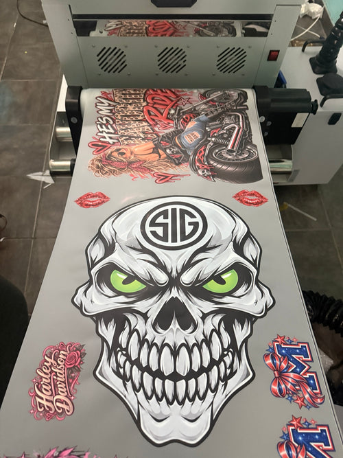 DTF gang sheet with large skull and motorcycle designs